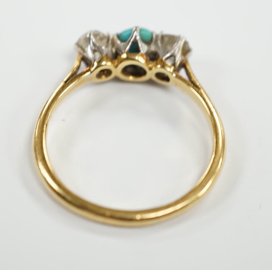 An 18ct, single stone turquoise and two stone diamond set ring, size O, gross weight 2.9 grams.